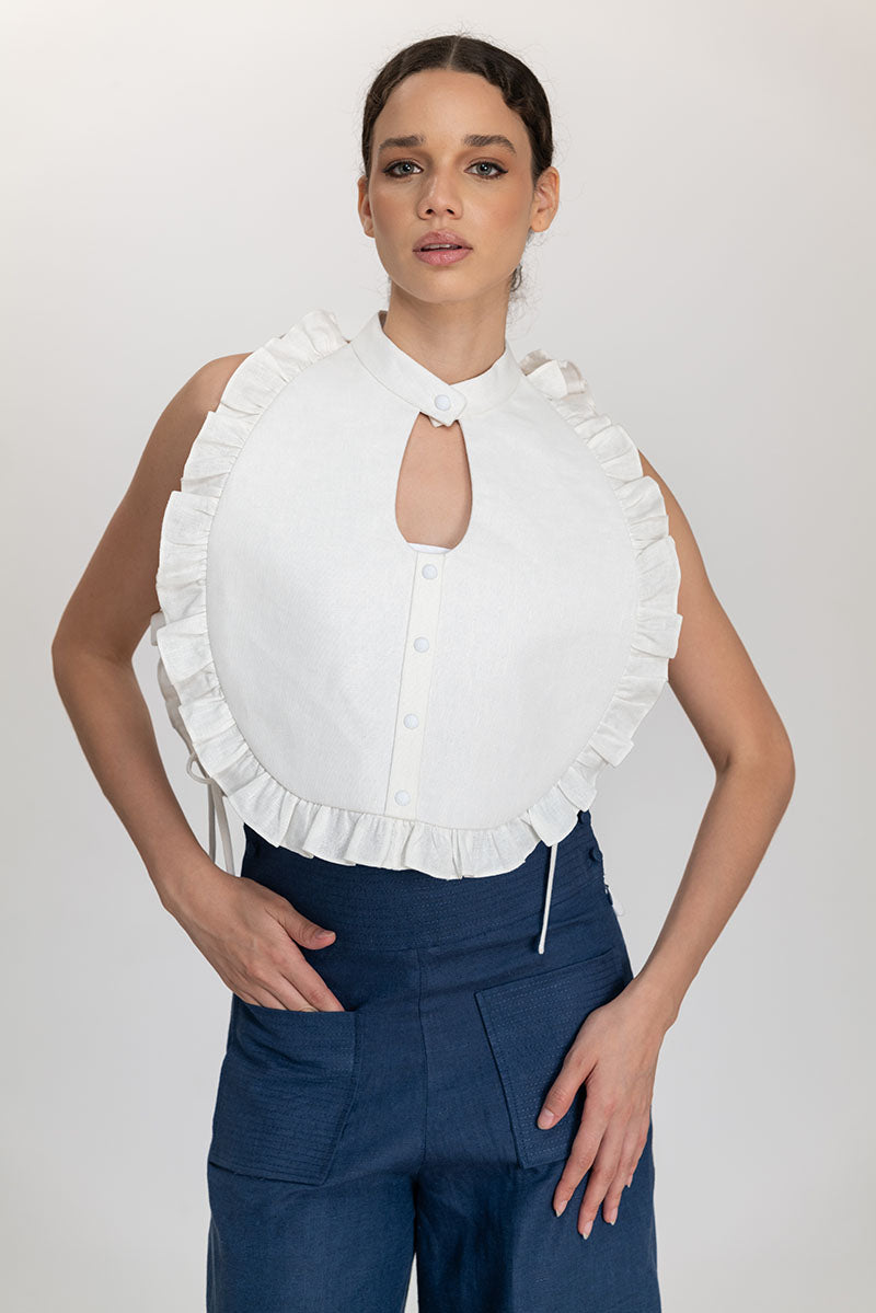 Ivory Ellen bib top by ANA + MARIA featuring a stylish high-neck design and intricate detailing, perfect for casual or dressy occasions.