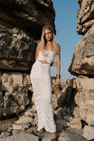 Elegant Gigii's Elysia Maxi Dress in flowing fabric, showcasing its stylish design and vibrant color.