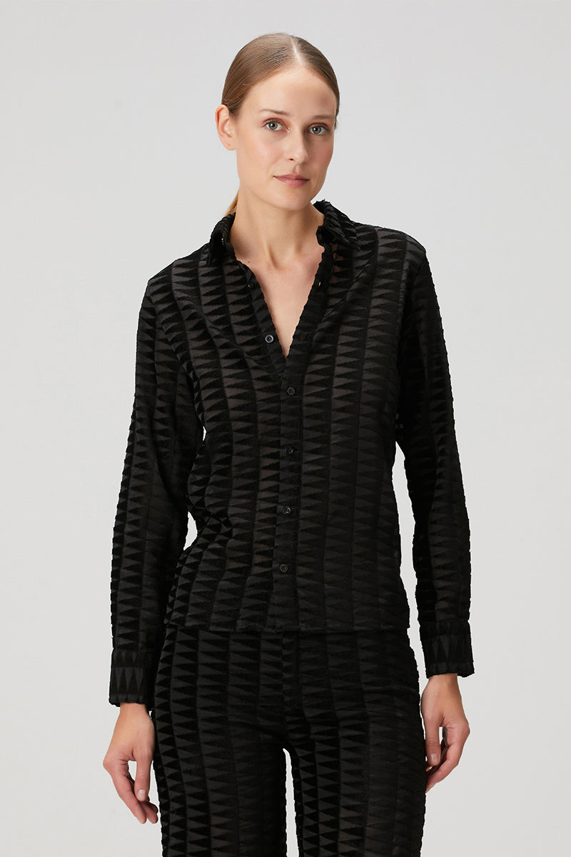 Black embossed tulle shirt by Bassigue featuring textured tulle fabric and a stylish, modern design.
