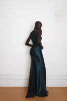 YASSMIN SALEH teal Embrace gown showing back view with flowing fabric and elegant design, perfect for formal occasions.
