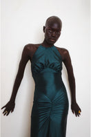 Close-up of YASSMIN SALEH Embrace teal gown showcasing elegant fabric and detailed design.