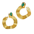 Gold earrings with open mini wave design featuring emerald accents, crafted by Fenomena.