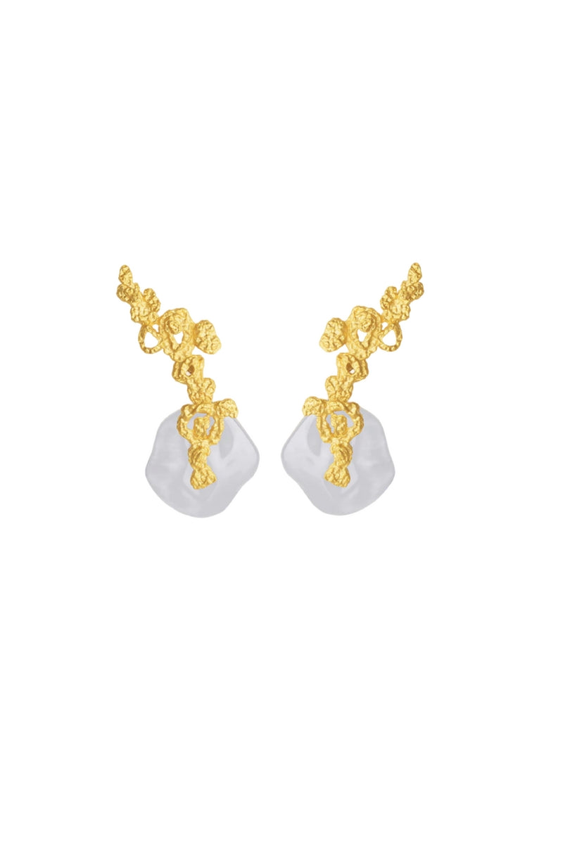 Jude Benhalim erosion gold and white earrings with textured design and elegant shape, displayed on a neutral background.
