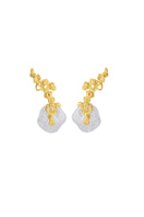 Jude Benhalim erosion gold and white earrings with textured design and elegant shape, displayed on a neutral background.