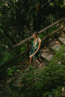 Maylé Vásquez Estero Romper in River Green, a stylish jumpsuit featuring a comfortable fit and modern design.