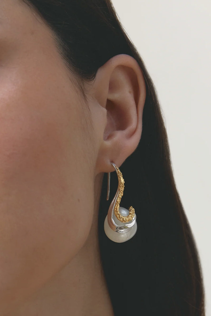 Jude Benhalim eternity earrings with intricate gold design featuring circular patterns and elegant craftsmanship.