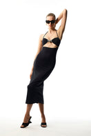 Black ETE skirt by Maliluha, stylish maxi skirt with flowing fabric and elegant design, perfect for casual or formal wear.