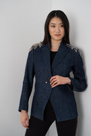 Nadya Shah AVA denim blazer for women, featuring classic blue denim fabric and tailored fit, styled with buttons and lapel collar.