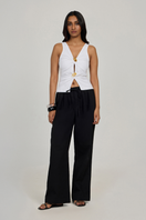 White Evia top by Summer Away, stylish sleeveless blouse with a relaxed fit, perfect for casual or summer outfits.