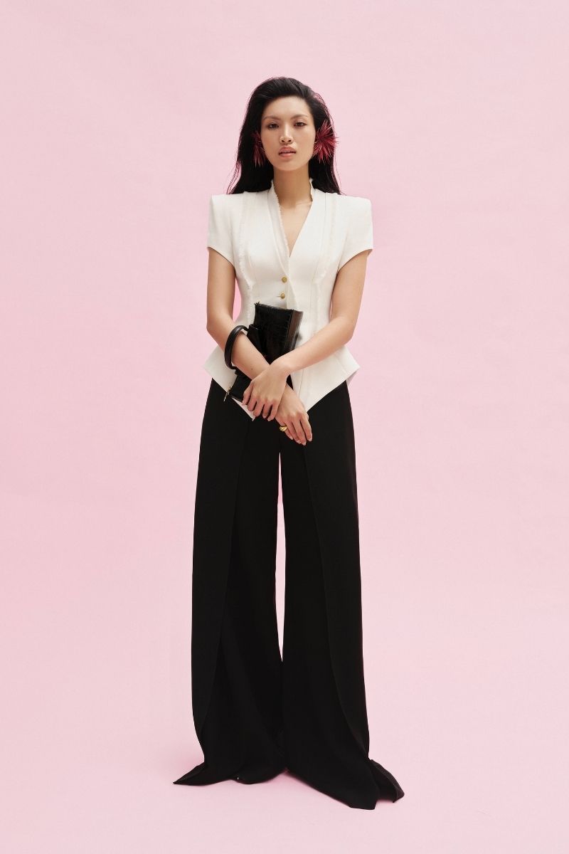 Jenny K Tran Faringdon Pants, stylish casual pants shown in the image with a relaxed fit and trendy design.