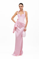 Sugar pink Fée gown by MOON / HAKAN YILDIRIM, featuring flowing fabric and elegant design, showcased in a full-length image.