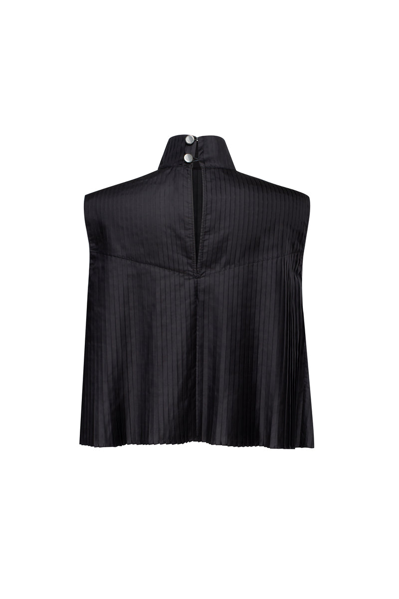 Black Fernanda top by Tamar Keburia, showcasing a stylish sleeveless design with a fitted silhouette and modern neckline.