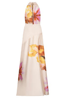 Tinta Latina Fiore floral maxi dress with vibrant floral pattern, flowing fabric, and elegant design perfect for summer or casual wear.