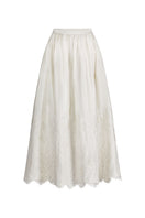 Scarlett Gasque Fiorella maxi skirt in flowing fabric with a high waist and elegant design, shown in a full-length view.