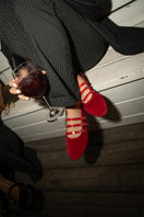 Red Flabelus Mina flat shoes with sleek design and pointed toe, perfect for casual and formal wear.