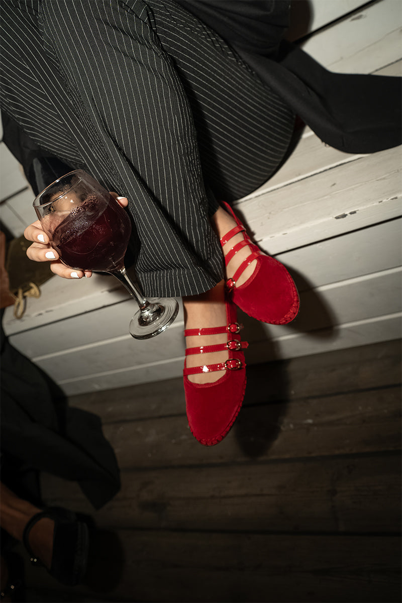 Red Flabelus Mina flat shoes with sleek design and pointed toe, perfect for casual and formal wear.