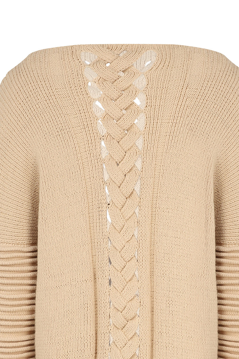 Ivory flat braided knitted sweater with accordion sleeves by MAZ Manuela Álvarez, showcasing textured knit and stylish design.