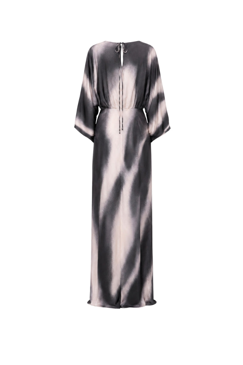 Black printed Tinta Latina Floresta maxi dress featuring a flowing silhouette and vibrant floral pattern.