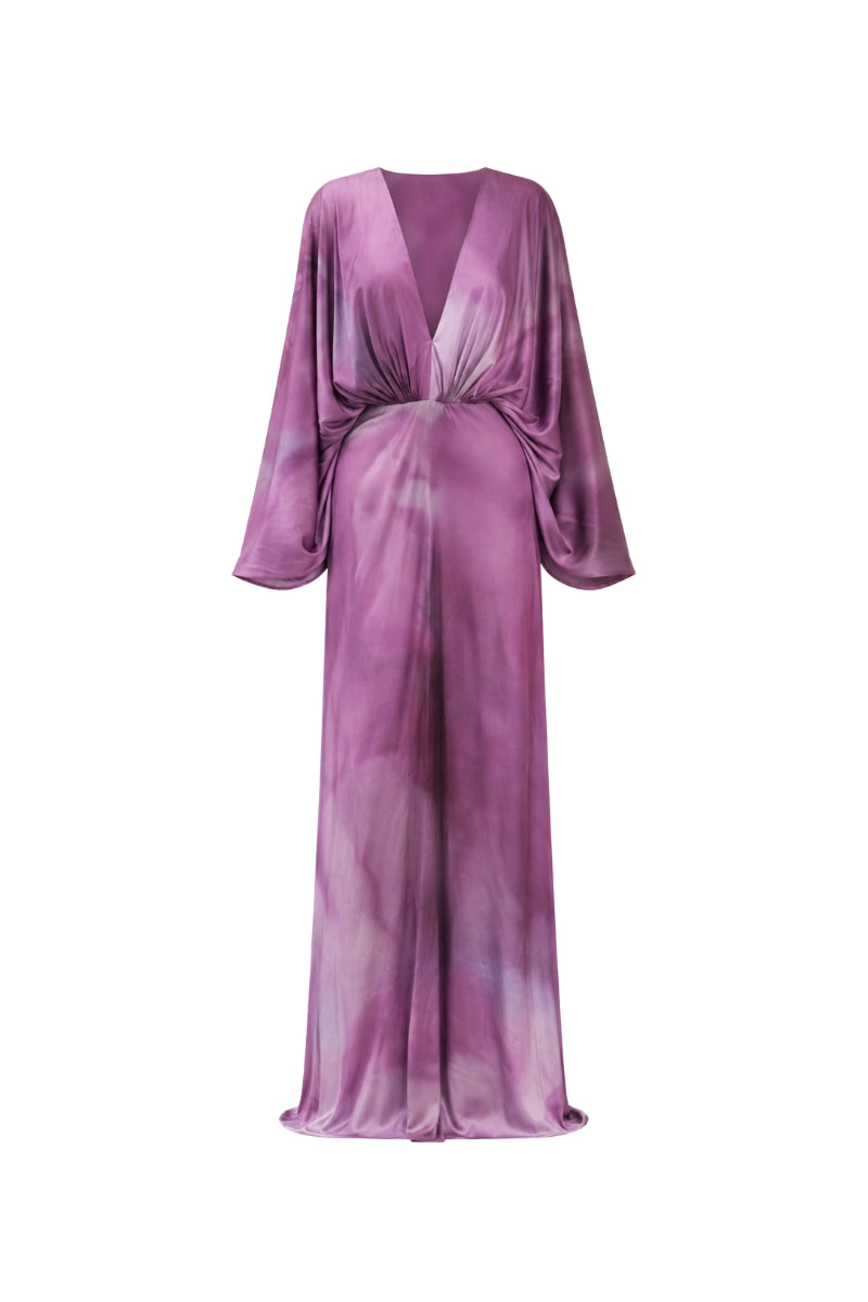 Purple floral print maxi dress by Tinta Latina featuring a flowing silhouette and vibrant pattern.