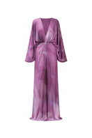 Purple floral print maxi dress by Tinta Latina featuring a flowing silhouette and vibrant pattern.