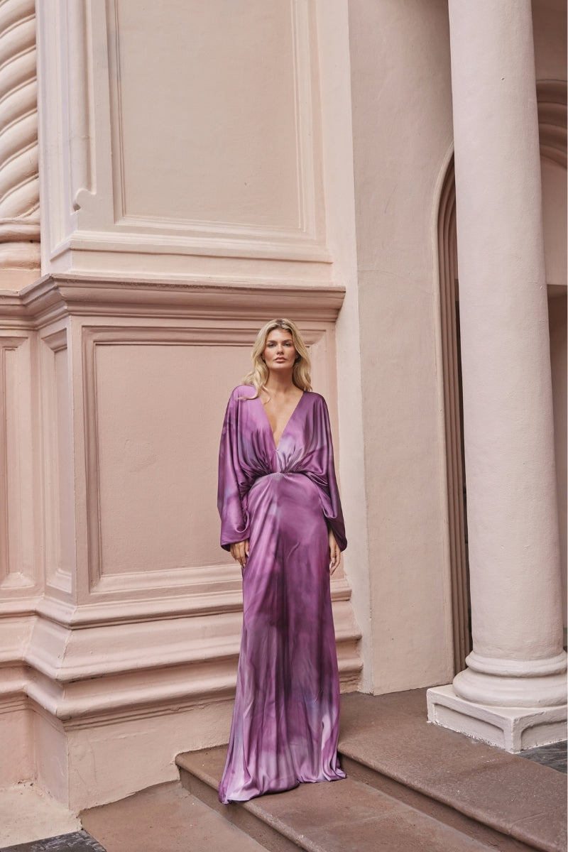Purple floral print maxi dress by Tinta Latina, flowing fabric and elegant design ideal for summer or casual occasions.