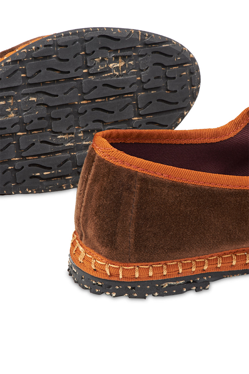 Brown velvet Frida Mary Jane flats by Flabelus with light brown piping, featuring a classic, elegant design for stylish comfort.