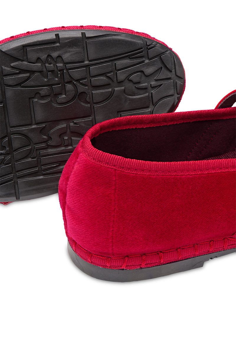 Red Flabelus Mina Flat shoes shown from the side, featuring a sleek design and comfortable flat style.
