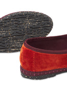 Red-orange velvet flats with burgundy piping by Flabelus, featuring a classic Mary Jane style and elegant design.