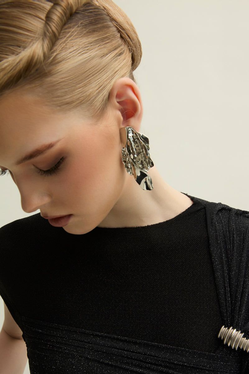 Black Freya gown by Jenny K Tran, featuring elegant design and flowing fabric, perfect for formal occasions.