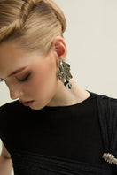 Black Freya gown by Jenny K Tran, featuring elegant design and flowing fabric, perfect for formal occasions.