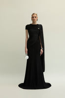 Black Freya gown by Jenny K Tran featuring elegant fabric and a flattering silhouette, perfect for formal occasions.
