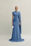 Jenny K Tran Freya blue gown, elegant dress with flowing fabric and intricate detailing, perfect for formal occasions.