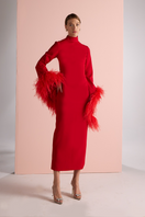 Red halter neck midi dress by Joanna Andraos, front view showing fitted bodice and flowing skirt.