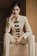 White Plan Fungle Jacket, stylish and durable outerwear with a modern design, shown with matching trousers.
