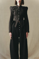 Close-up of Sean Sheila BESKAP Jacket showing detailed fabric texture and stitching, part of the FW25 collection.