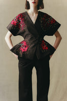 Red embroidered kimono top by Sean Sheila featuring intricate embroidery and flowing fabric, perfect for stylish layered looks.