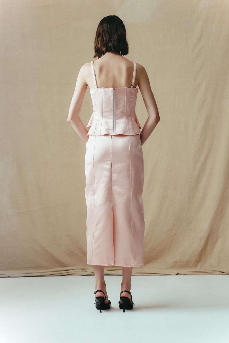 Sean Sheila A-line midi skirt with corset panels, shown from the back with a stylish, structured design for a modern look.