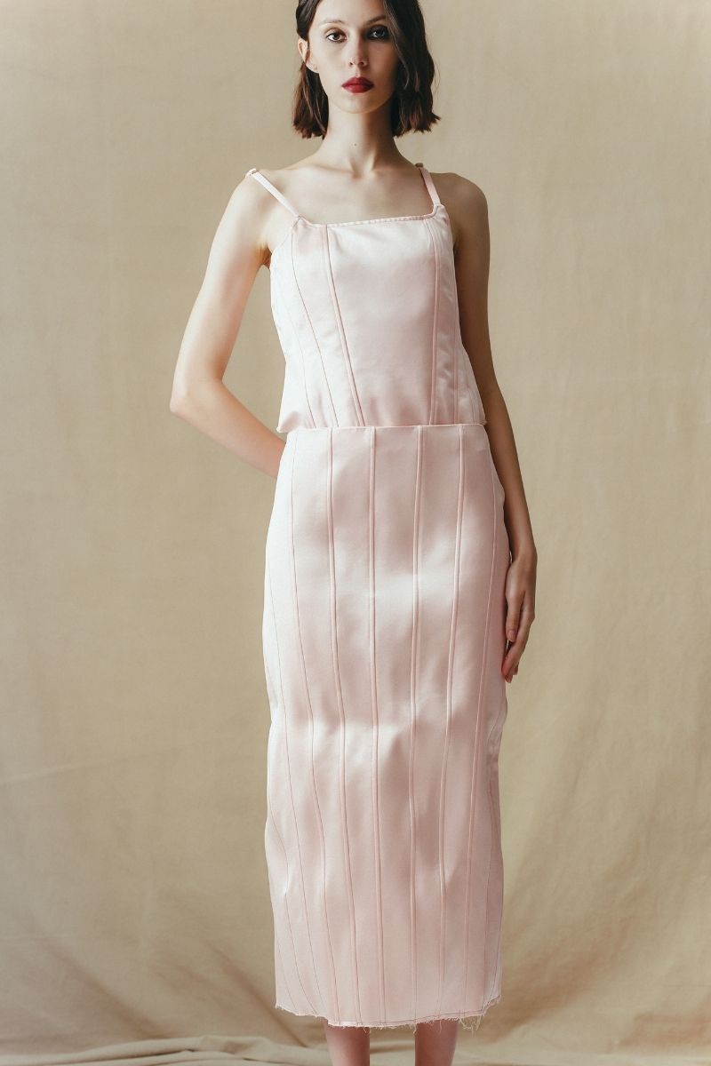 Sean Sheila A-line midi skirt with corset panels, showcasing a stylish and structured design in the FW25 collection.