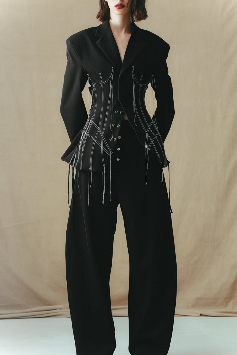Black cowboy trousers by Sean Sheila with detailed stitching and classic Western styling, shown on a neutral background.