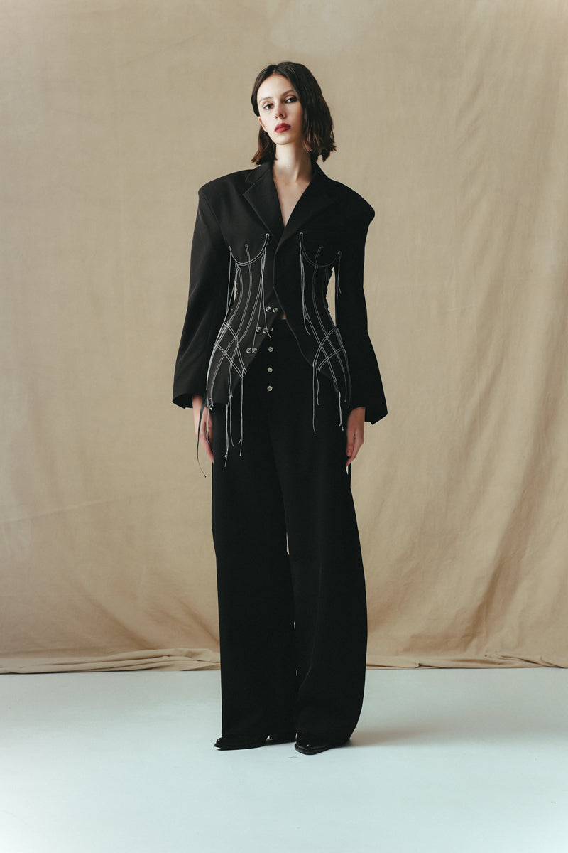 Black cowboy trousers by Sean Sheila, front view showing classic Western-style pants with belt loops and stitching details.