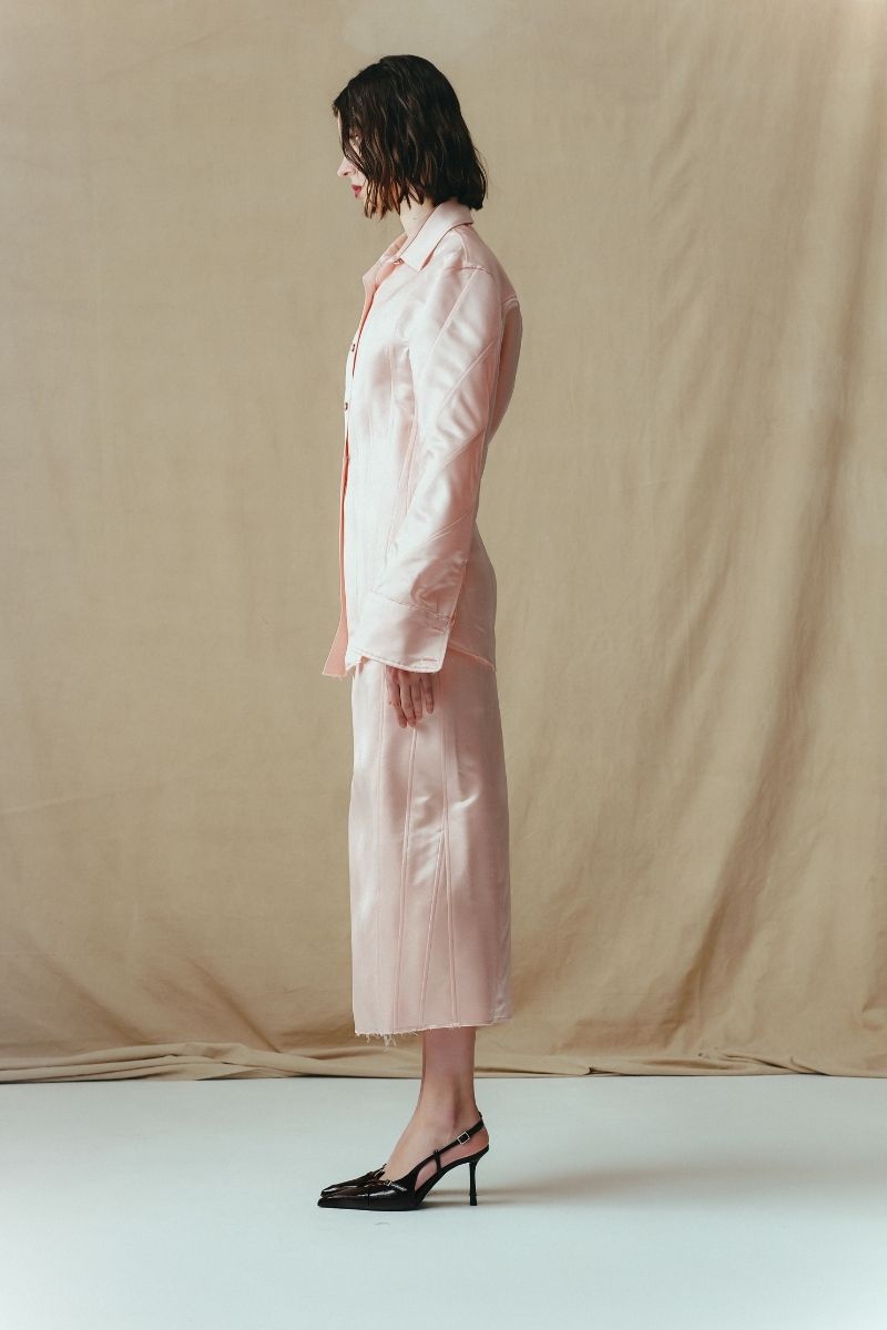 Sean Sheila tailored shirt with corset panels, shown from the side, featuring fitted design and structured details.