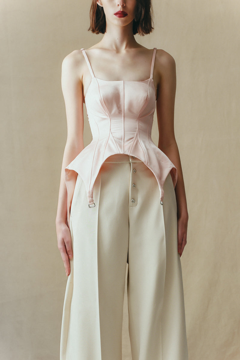 Sean Sheila blush corset top, detailed front view showing fitted design and elegant fabric texture.