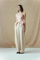 Sean Sheila blush corset top, side view showing fitted design, structured bodice, and stylish silhouette.
