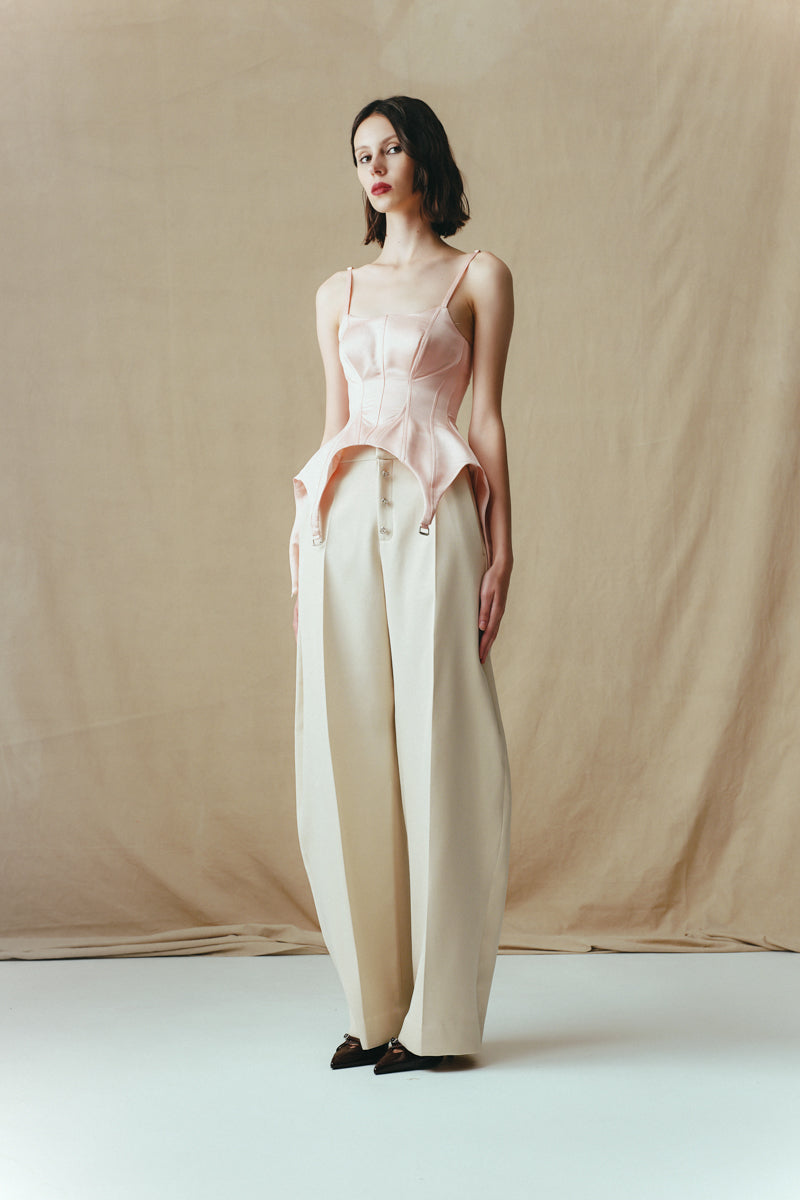 Sean Sheila blush corset top, side view showing fitted design, structured bodice, and stylish silhouette.