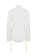 White corset panelled shirt by Sean Sheila, shown from the back with structured design and tailored fit.