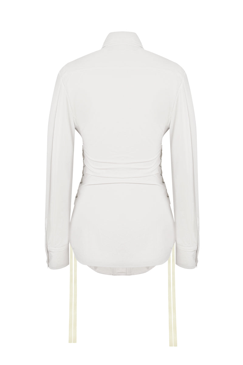 White corset panelled shirt by Sean Sheila, shown from the back with structured design and tailored fit.