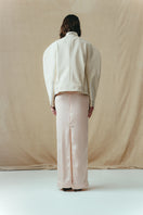 Sean Sheila rounded motor jacket with a sleek design, shown from the back, in a stylish and modern jacket style.