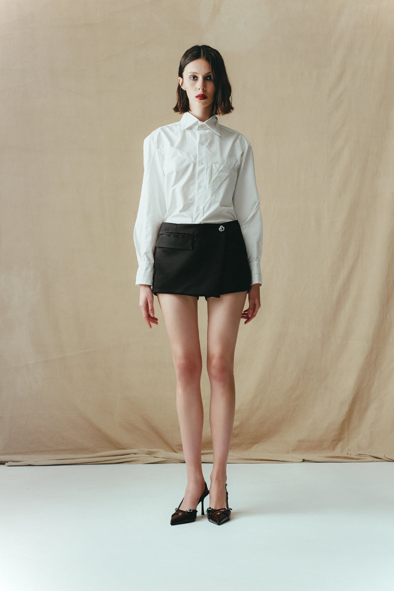 Black Sean Sheila mini skort, stylish shorts with a sleek design, shown from the front in the FW25 collection.