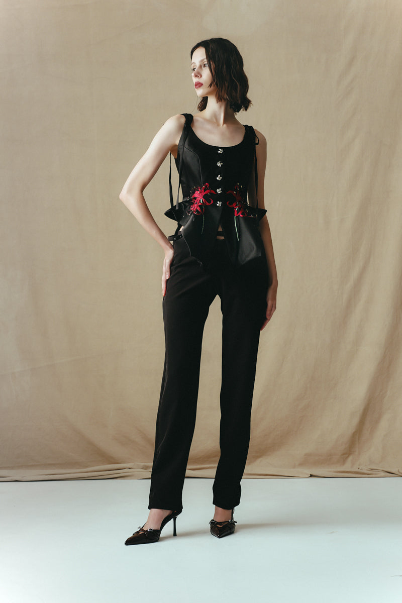 Red embroidered tank top by Sean Sheila with intricate embroidery, front view showcasing stylish sleeveless design.