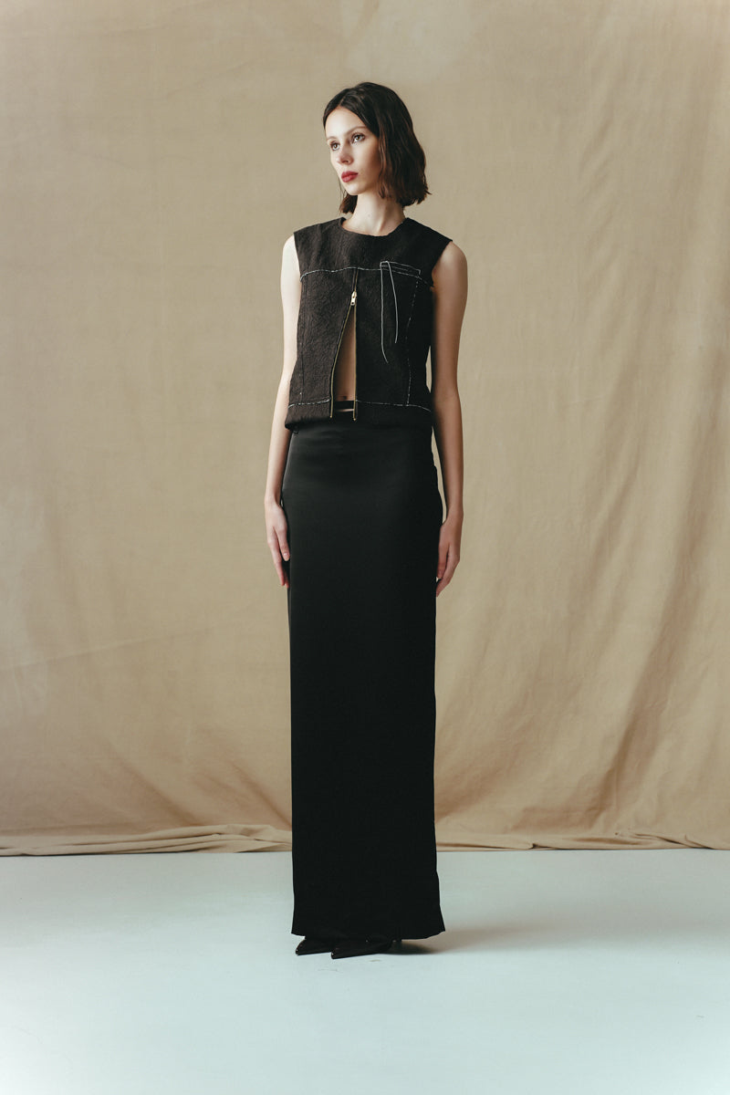 Side view of Sean Sheila black crinkled top, showcasing its textured fabric and relaxed fit.
